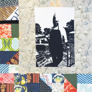 Darryl Shular leaning against a gate in an apron.