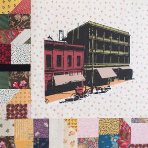 Two horse and carriages in front of two buildings.