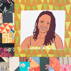 Makini Howell smiling.