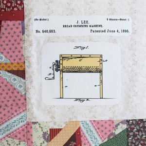 A drawing of a dough kneading machine and its parts.