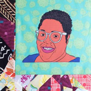 Therese Nelson smiling.