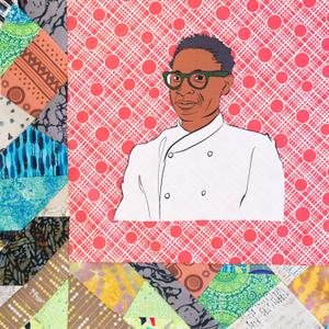Pierre Thiam smiling in a white chef coat.