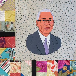 Rudy Lombard in a suit jacket.