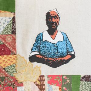 Betty Simmons in a blue dress with her hands folded.