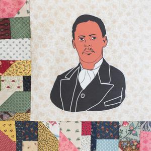 T.A. Carrington in black suit jacket.