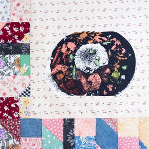 A plate of rice and seafood.