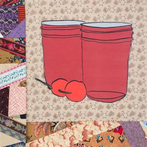 Two red cups and two red cherries.