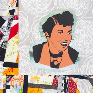 Freda DeKnight smiling.