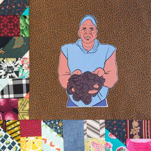 Will Allen holding soil in his hands.