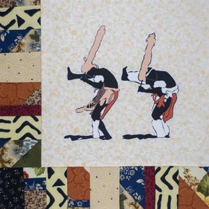 Two men of the in tribal clothing.